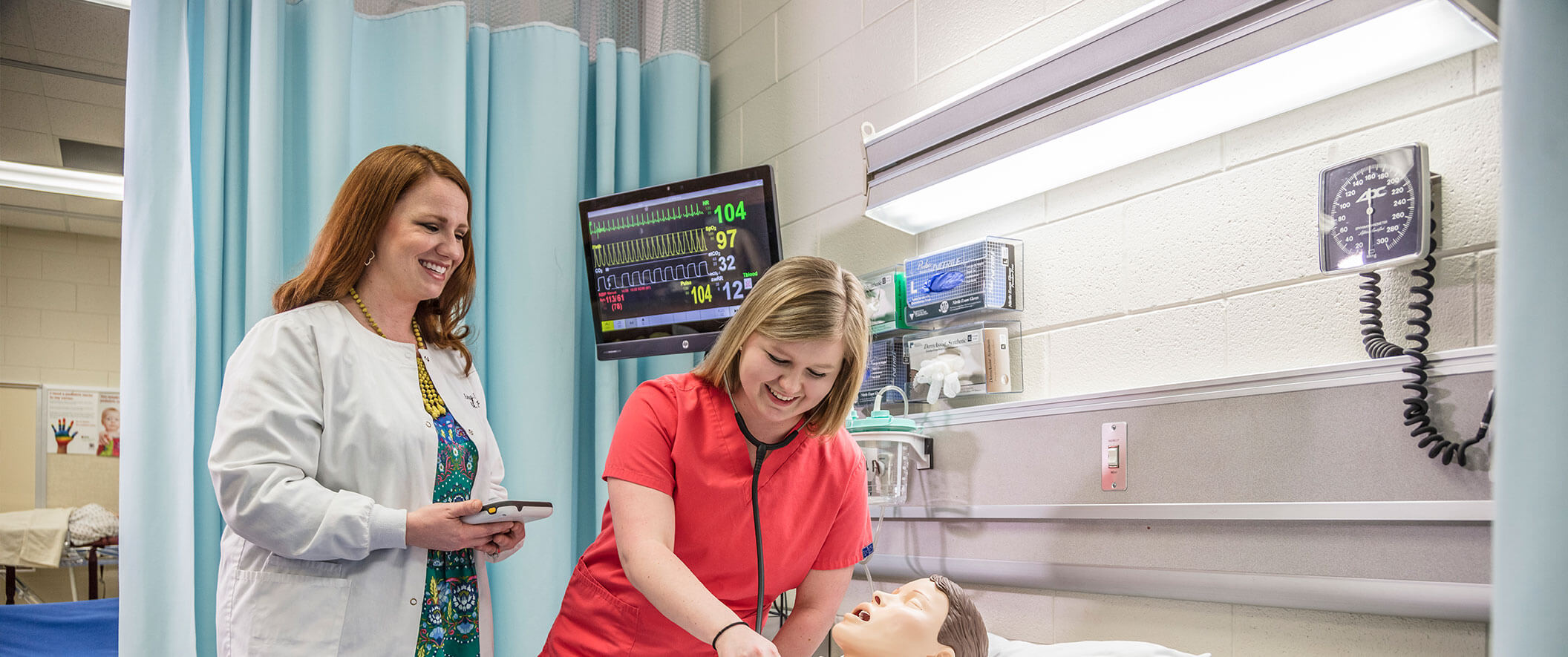 nursing students working on dummy